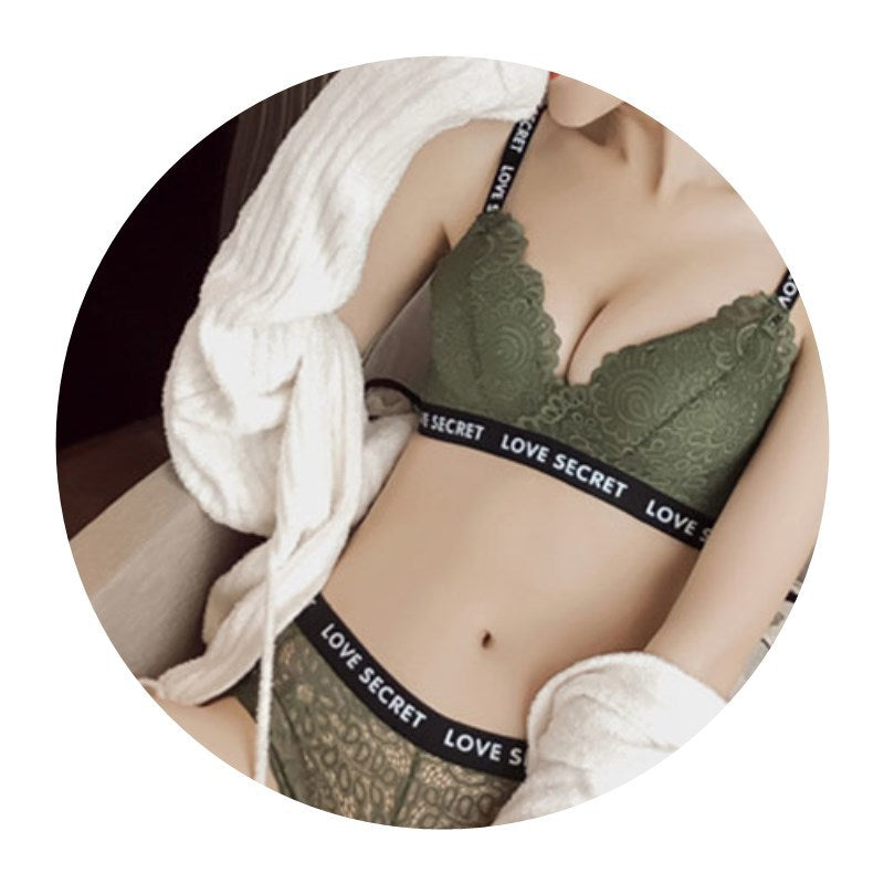 Green lace bra underwear gather set with black "LOVE SECRET" straps and matching panty