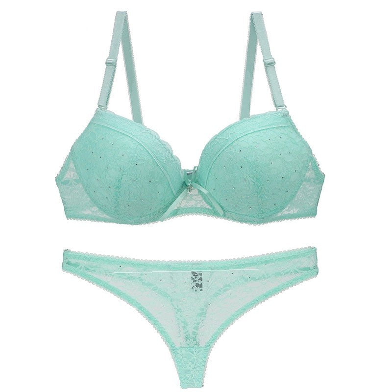Light green sexy lace bra and panty set with delicate embroidery and adjustable straps