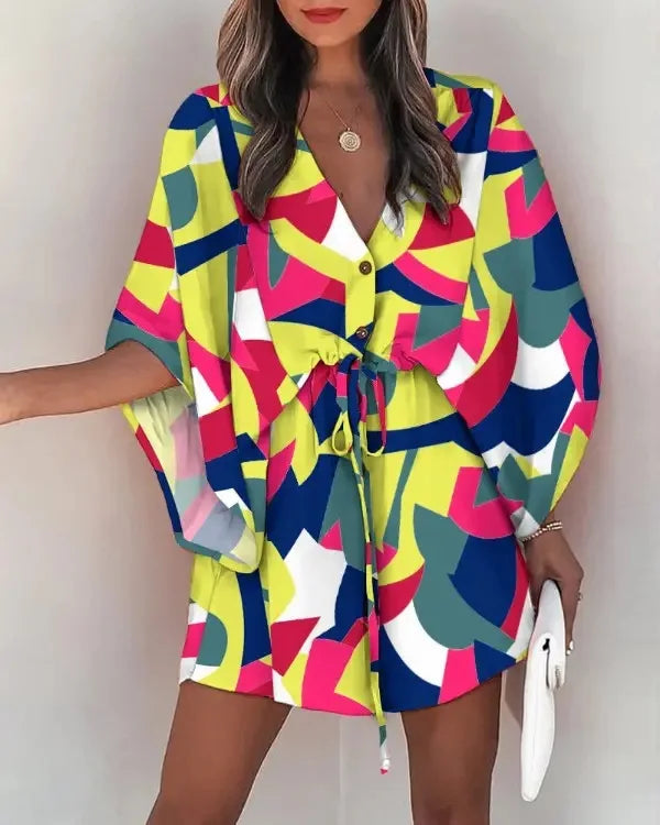 Colorful fashion print V-neck lace-up summer dress with short sleeves and abstract pattern