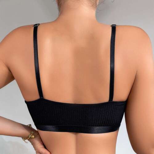 Back view of a woman wearing a black sexy lace bralette with adjustable straps and a ribbed texture band.
