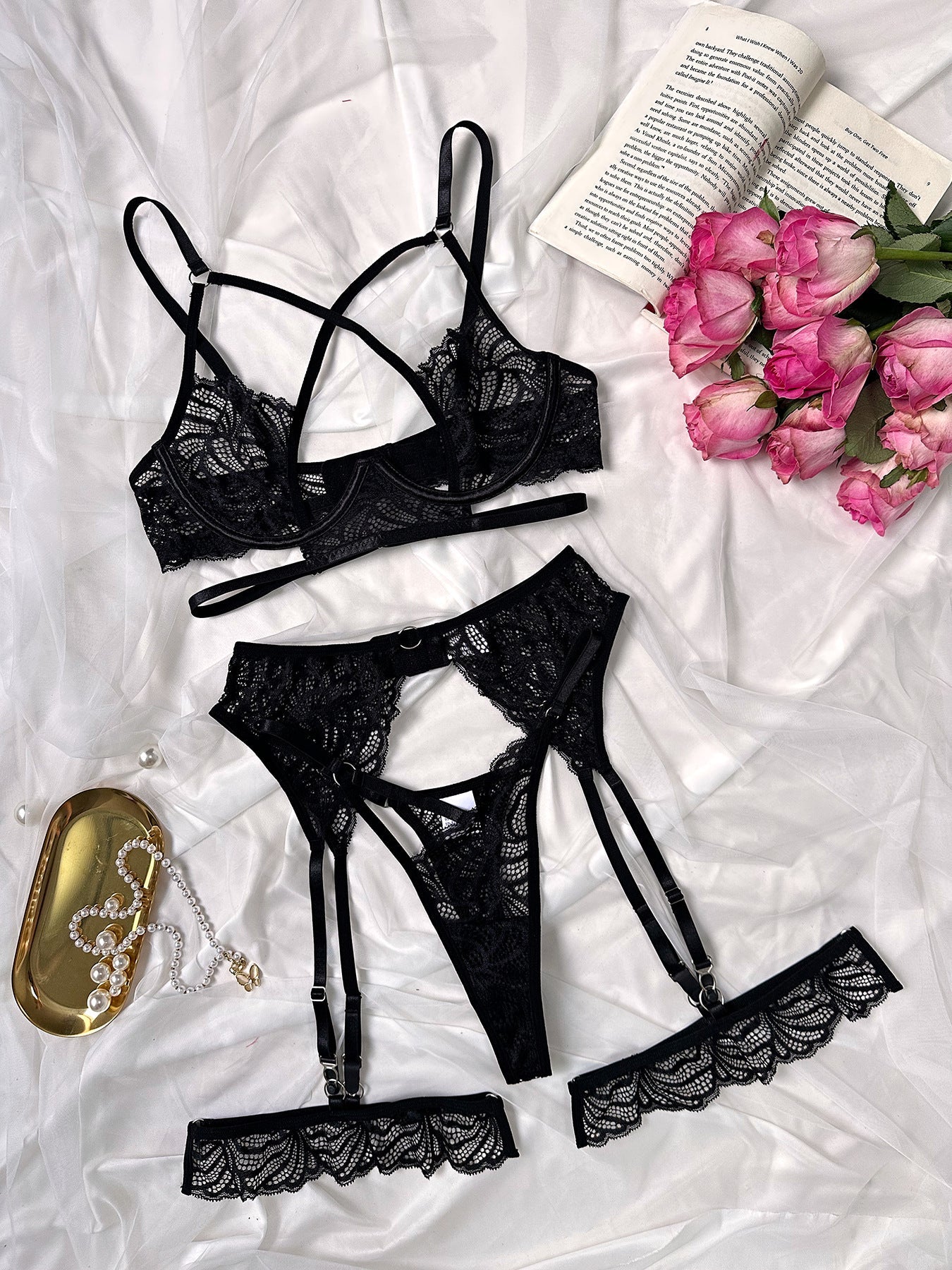 Sexy black lace lingerie set with steel ring accents, including bra, garter belt, thong, and lace cuffs