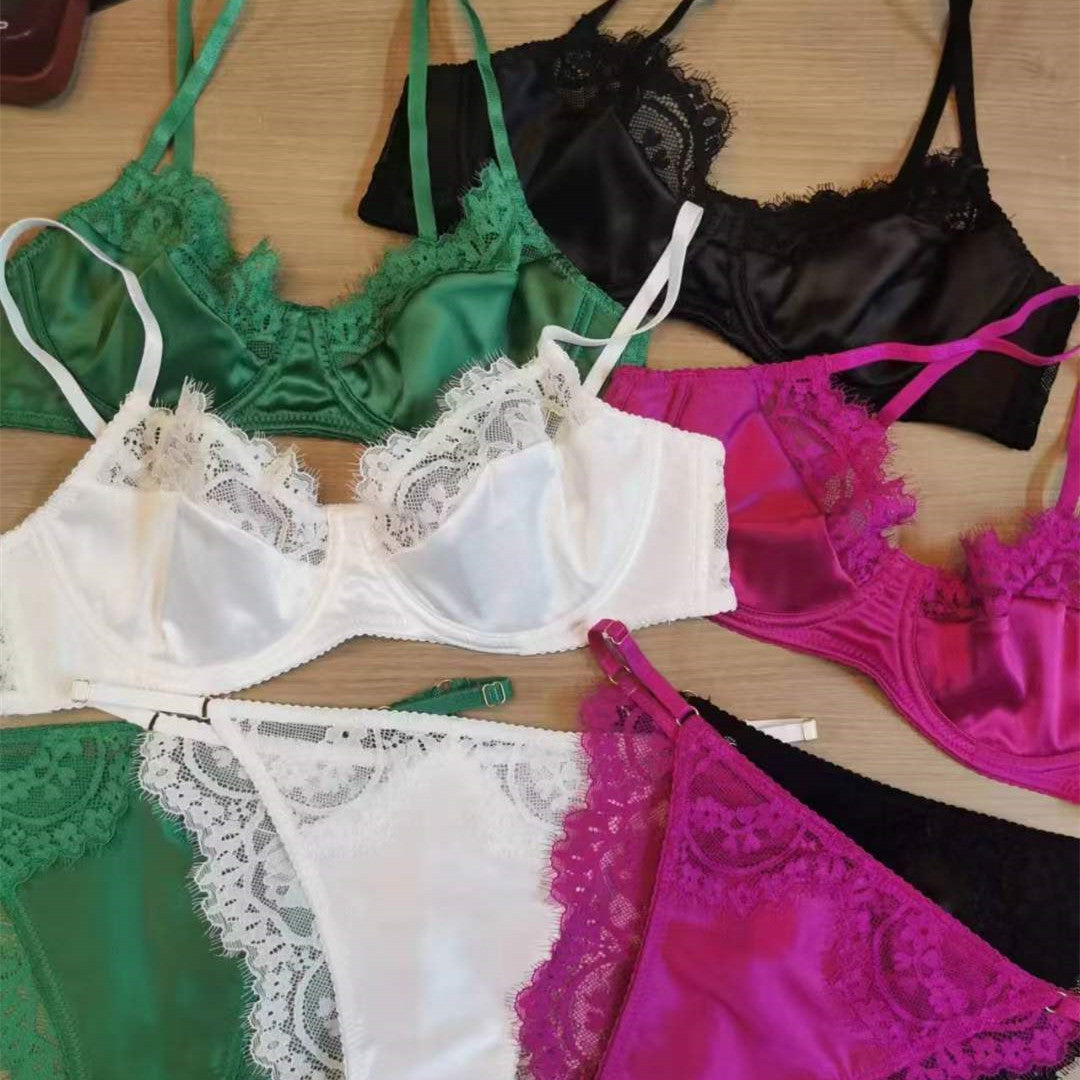Assorted summer sexy lace lingerie sets in white, black, green, and rose red with delicate lace details and adjustable straps.
