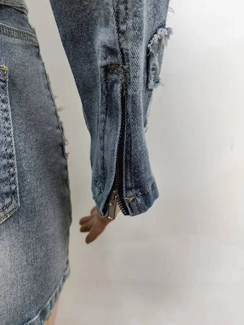 Close-up of distressed denim jacket sleeve with zipper detail from Chic Denim Tassel Two-Piece Set for women