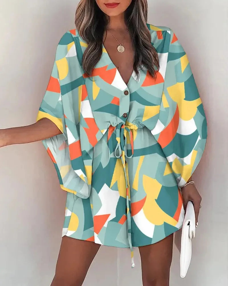 Fashion Print V-Neck lace-up summer dress with colorful abstract pattern and button front design