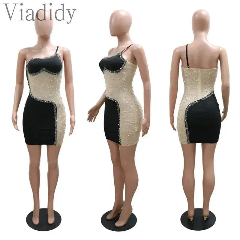 Black and beige rhinestone mesh one shoulder club dress with sleek zipper detail shown from front, side, and back views on mannequin