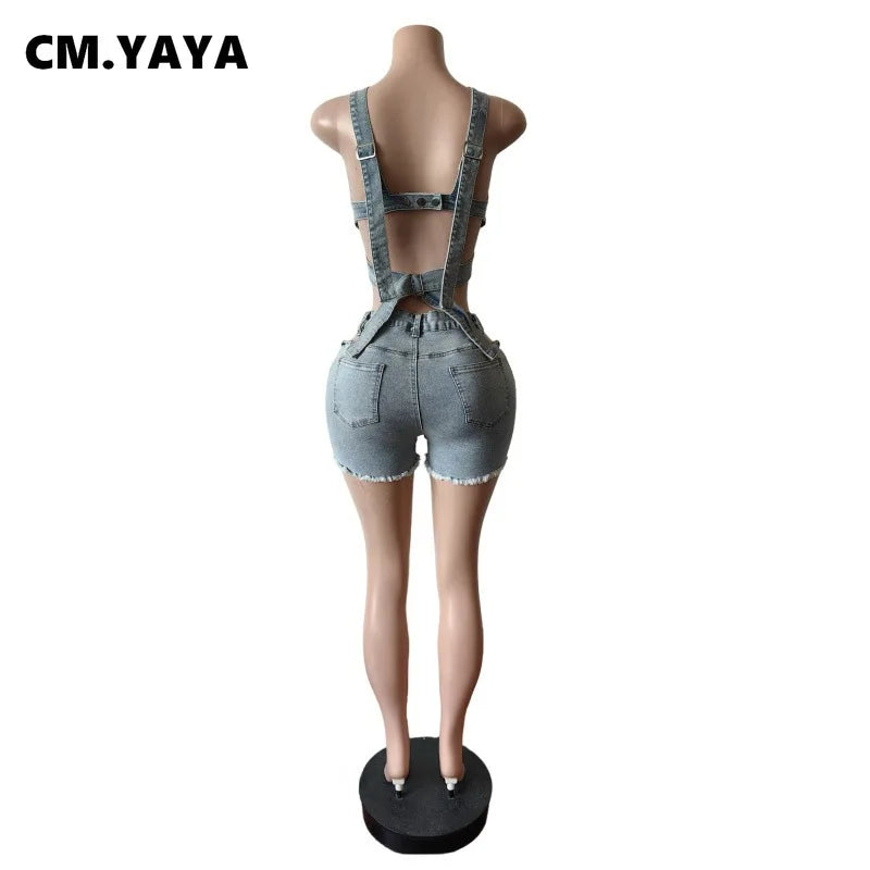 Back view of chic denim crop top with wrap straps paired with high-waisted denim shorts on mannequin