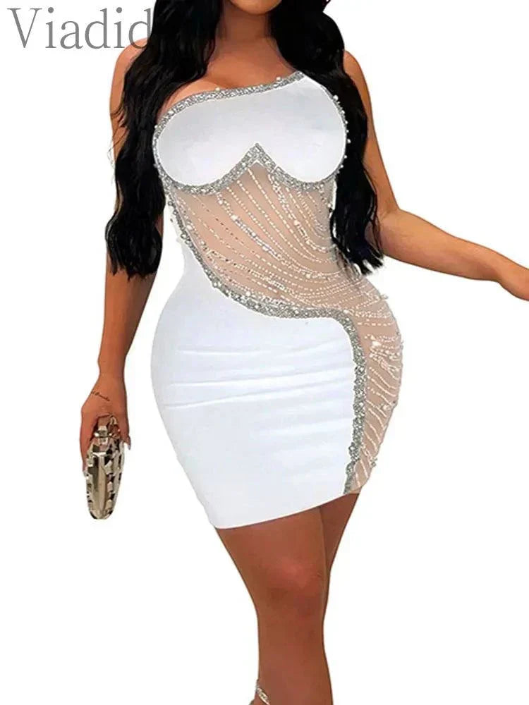 White rhinestone mesh one shoulder club dress with fitted silhouette and sparkling detail