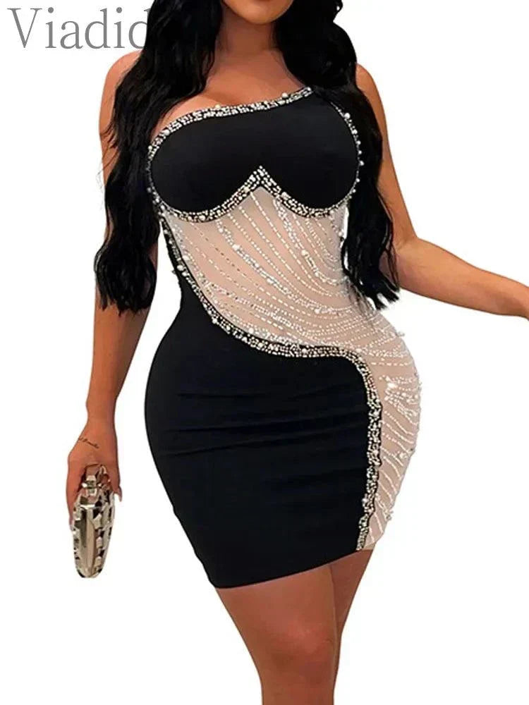 Black rhinestone mesh one shoulder club dress with asymmetrical design and curve-hugging fit