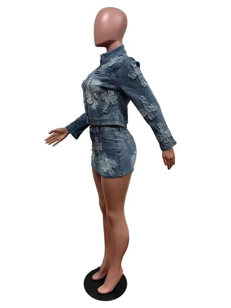 Chic denim tassel two-piece set for women featuring embroidered jacket and bodycon mini skirt