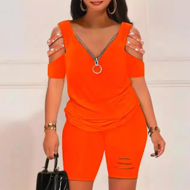 Bright orange summer casual hollow out 2-piece set with zip front top and fitted shorts for women