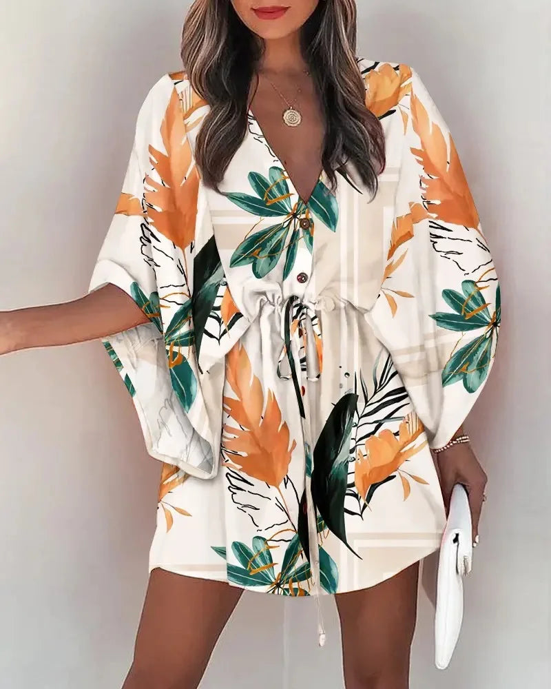 Fashion print V-neck summer dress with lace-up waist and tropical leaf pattern