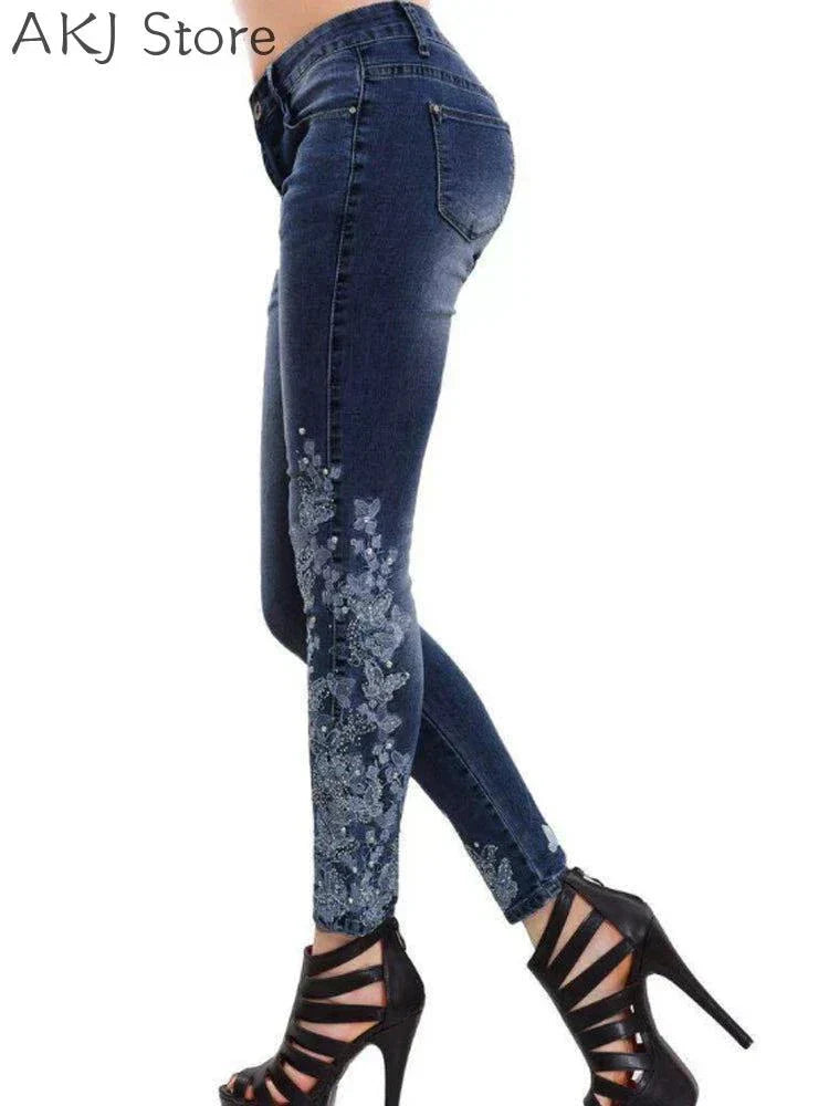 Women's dark blue floral embroidered skinny jeans with high heels