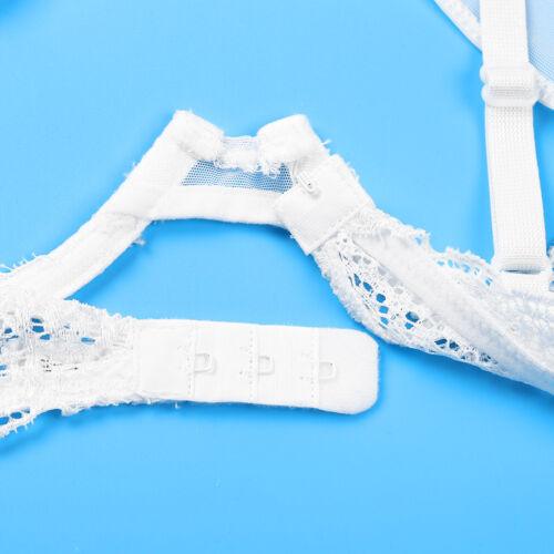 White sheer floral lace cupless bra with adjustable straps and hook-and-eye closure on blue background